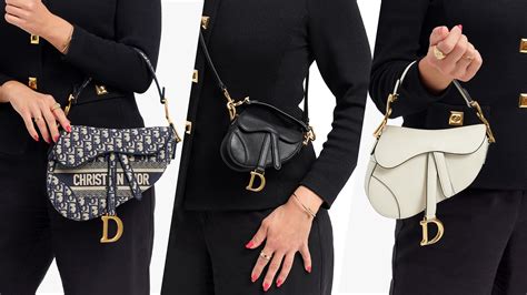 white and gold dior saddle bag